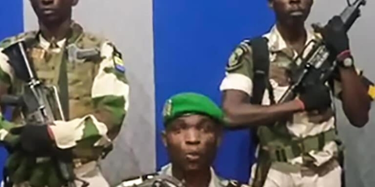 In this video grab made on a video footage obtained on YouTube on January 7, 2019, Gabon soldiers leave a studio of state radio after an address calling on the people to "rise up" and announcing a "national restoration council" would be formed, as an ailing President Ali Bongo is out of the country. - The message was read on state radio by a person who identified himself as the deputy commander of the Republican Guard and head of a group called the Patriotic Youth Movement of the Gabonese Defence and Security Forces. (Photo by - / various sources / AFP) / RESTRICTED TO EDITORIAL USE - MANDATORY CREDIT "AFP PHOTO / YOUTUBE " - NO MARKETING NO ADVERTISING CAMPAIGNS - DISTRIBUTED AS A SERVICE TO CLIENTS